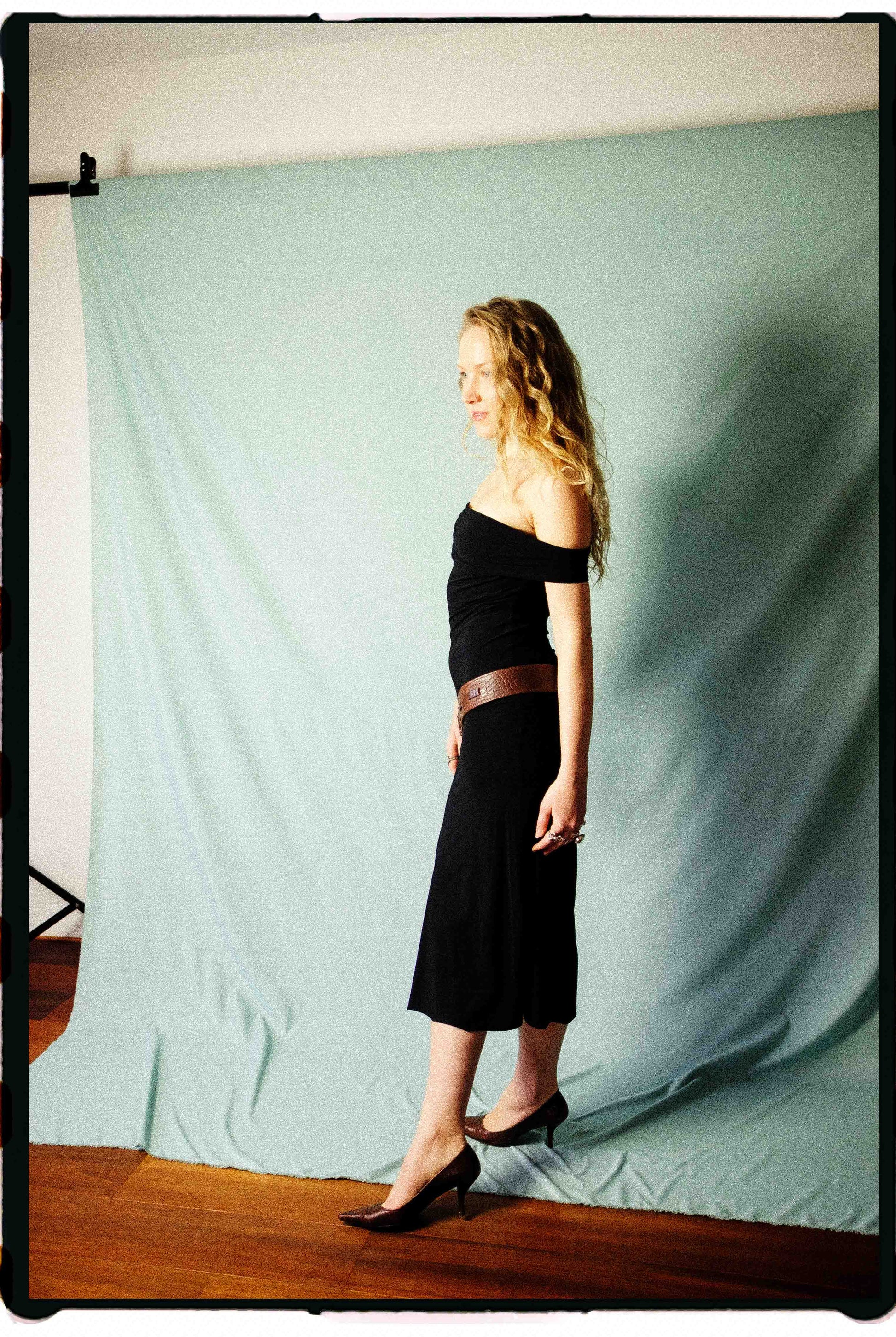 Marithé + François Girbaud black off-shoulder midi dress from the 90s, front view
