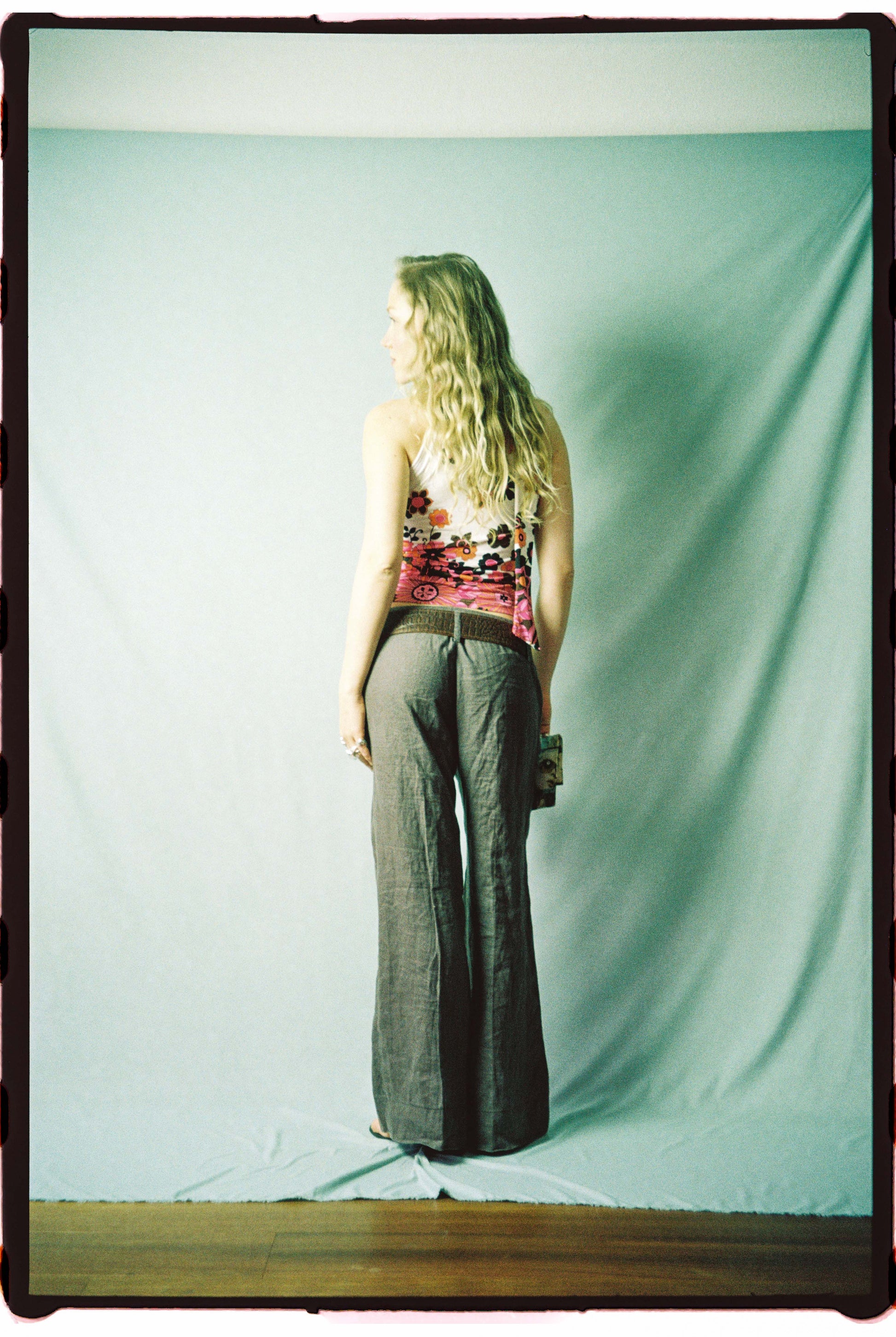 Taupe linen trousers, back view